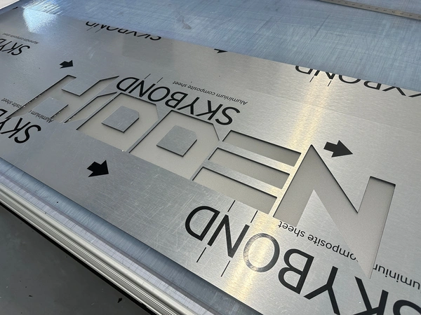ACM Sign tray with opaque acrylic cut out letter sign